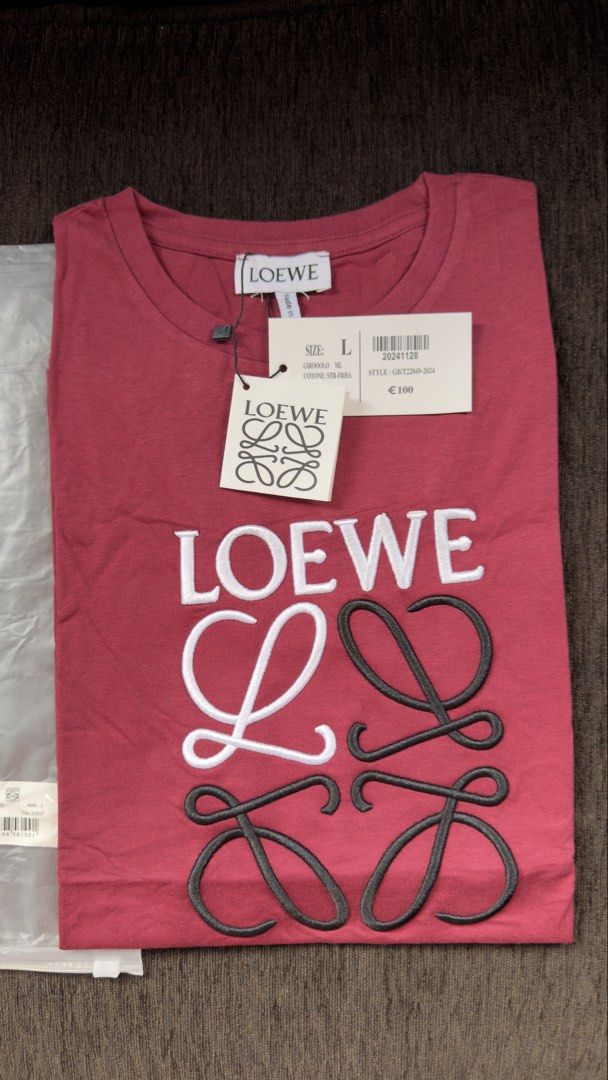 Loewe T-shirt (Category: Shirts) located in Angat. Submitted by shopmyclosetbykris (Listing ID 1470313363, Image 1). Description: LOEWE Women's cut OG quality shirts! Same tags ect. Highest quality fabric (stretchy) Limited pcs only! No more restock! Made in Portugal, not BKK With sizes, not free size Price: 880 each only Location: Baliwag Bulacan .
