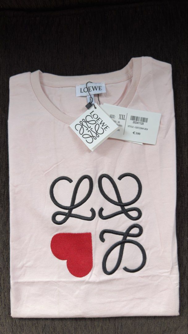 Loewe T-shirt (Category: Shirts) located in Angat. Submitted by shopmyclosetbykris (Listing ID 1470313363, Image 2). Description: LOEWE Women's cut OG quality shirts! Same tags ect. Highest quality fabric (stretchy) Limited pcs only! No more restock! Made in Portugal, not BKK With sizes, not free size Price: 880 each only Location: Baliwag Bulacan .