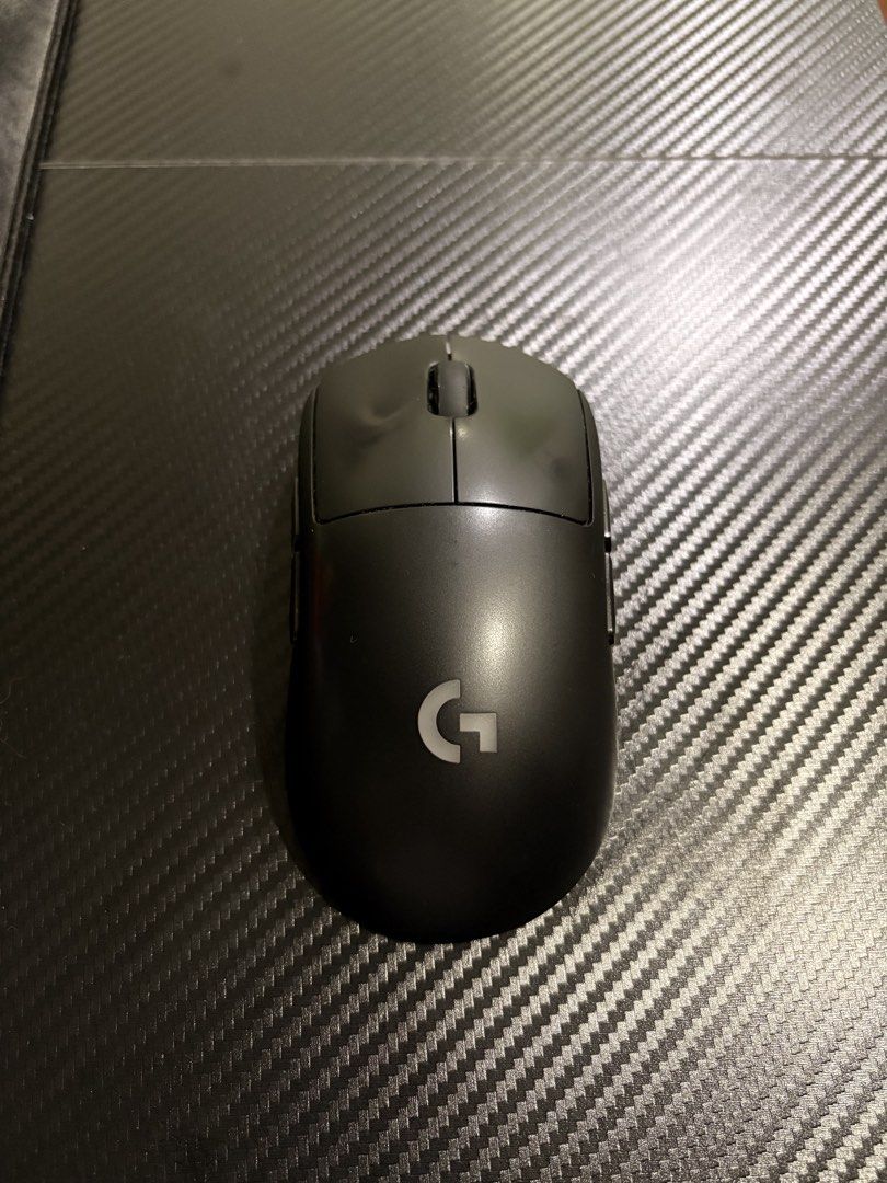 Logitech G Pro Wireless Gaming Mouse with Charging Cable (Category: Mouse & Mousepads) located in Quezon City. Submitted by joshuacmontano (Listing ID 1470329821, Image 2). Description: - Model: Logitech G Pro Wireless Gaming Mouse (Black) - Condition: Fully functional, well-used, mouse skates can be replaced but still in good condition. - Upgrades: Clean white replacement mouse skates installed - Design: Ambidextrous shape with customizable side