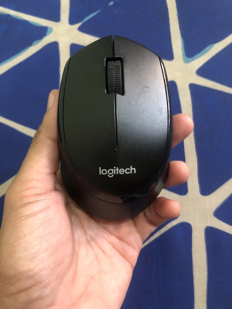 Logitech wireless mouse m330 (Category: Mouse & Mousepads) located in Quezon City. Submitted by markgolveo (Listing ID 1470142662, Image 2). Description: Logitech wireless mouse m330 Authentic Tested working properly.