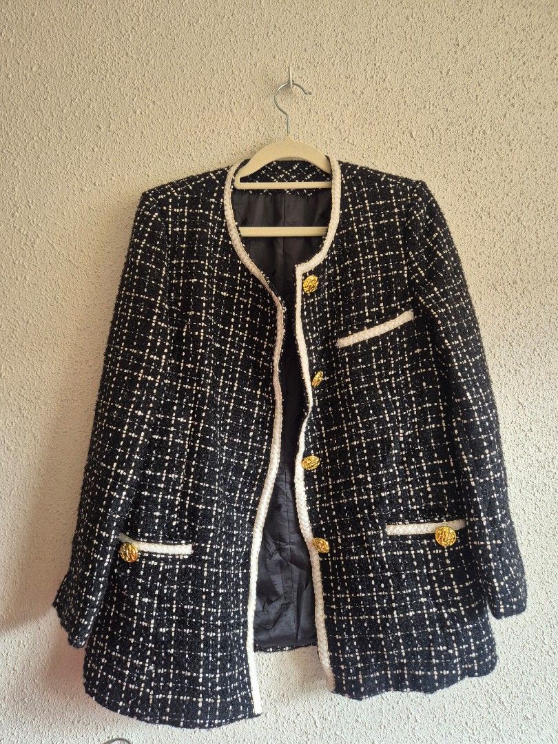 Long Black and White Tweed Jacket with Gold Buttons (Category: Coats, Jackets and Outerwear) located in Manila. Submitted by belovedbyjess (Listing ID 1470150402, Image 1). Description: - Classic black and white tweed jacket - Structured open-front design with white braided trim - Elegant gold embossed buttons on placket and decorative pockets - Fully lined in comfortable black fabric - Versatile layering piece for work or casual outings No when 