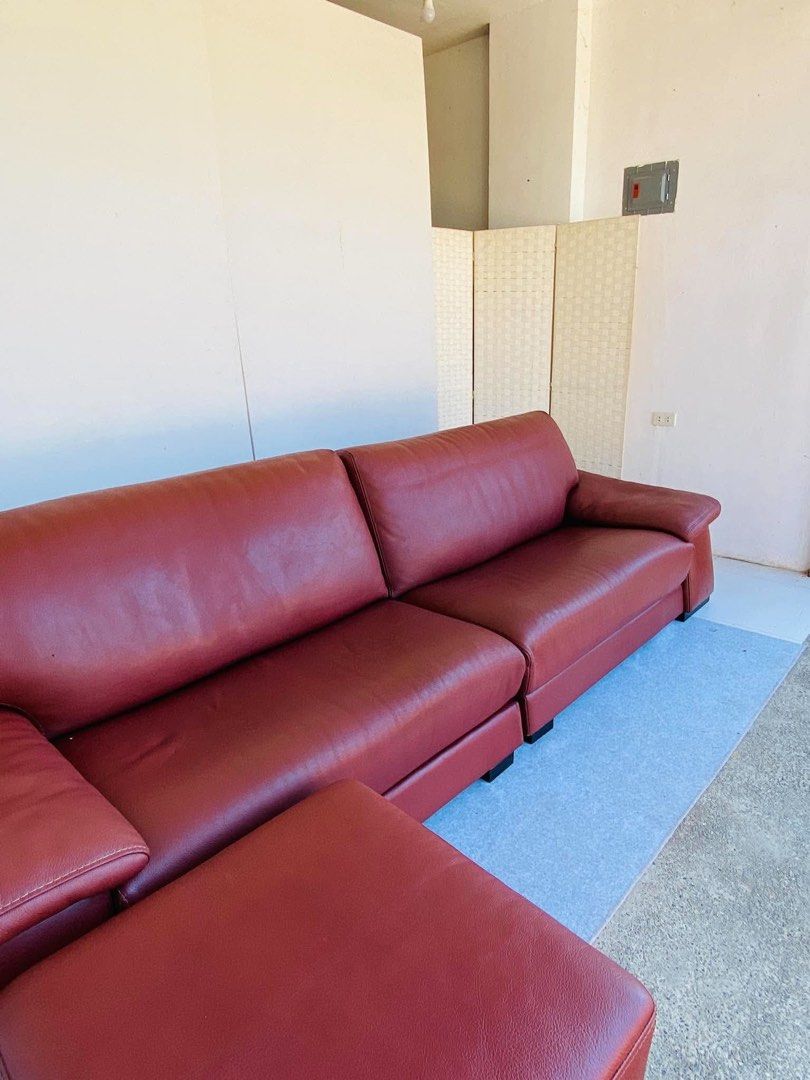 Long Leather Sofa "DAUNING" (Category: Sofas) located in Manila. Submitted by elliefurnies31 (Listing ID 1470273571, Image 3). Description: "JAPAN SURPLUS" PREMIUM "DAUNING" LONG LEATHER SOFA SET IN RICH REDDISH-BROWN WITH OTTOMAN SIZE: 124L" x 38W" x 18Sh" x 32H" inches (AS-IS ITEM) IN GOOD CONDITION.