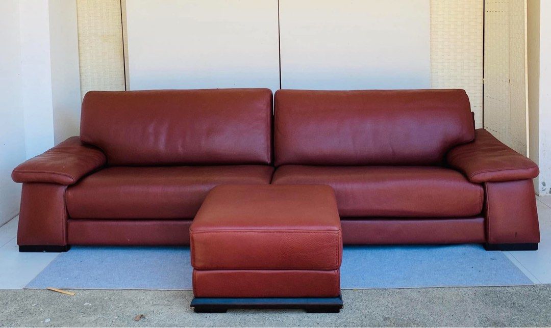 Long Leather Sofa "DAUNING" (Category: Sofas) located in Manila. Submitted by elliefurnies31 (Listing ID 1470273571, Image 2). Description: "JAPAN SURPLUS" PREMIUM "DAUNING" LONG LEATHER SOFA SET IN RICH REDDISH-BROWN WITH OTTOMAN SIZE: 124L" x 38W" x 18Sh" x 32H" inches (AS-IS ITEM) IN GOOD CONDITION.