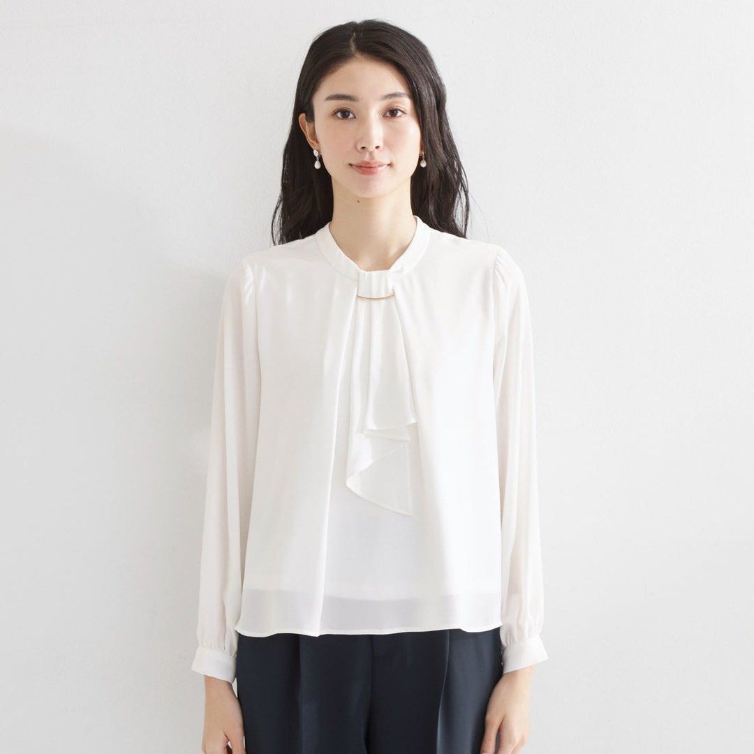 Long Sleeve Blouse with Gold Ring Detail (Category: Longsleeves) located in Binan City. Submitted by hannahbanana928 (Listing ID 1470206403, Image 1). Description: - Brand: Purelast - Color: Off White - Material: Lightweight chiffon-like fabric (semi-sheer sleeves) - Design: Round neckline with subtle gold ring accent and stylish front drape panel - Closure: Button closure at the back neck - Styling: Perfect for office wear or casual outings, eas