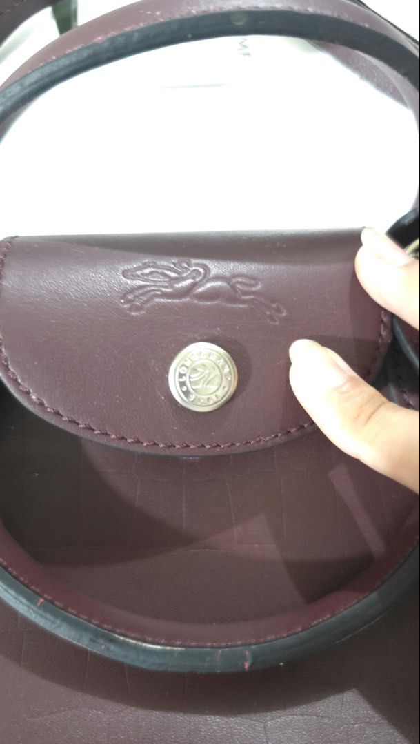 LONGCHAMP LE PLIAGE CUIR EXTRA SMALL / MINI TOP HANDLE BAG (Category: Shoulder Bags) located in Manila. Submitted by mahaechn (Listing ID 1470318746, Image 3). Description: PRELOVED LONGCHAMP LE PLIAGE CUIR EXTRA SMALL / MINI TOP HANDLE BAG 👜 * Brand: Longchamp * Model: Le Pliage Cuir Extra Small / Mini Top Handle Bag * Inclusion: Dust bag and authentication card * RFS: Decluttering * Please manage your expectations since this is a preloved item