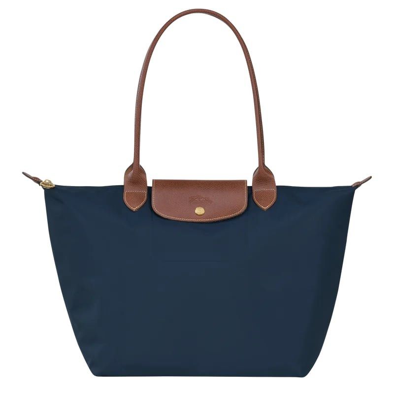 LONGCHAMP LE PLIAGE ORIGINAL SERIES LARGE LONG HANDLE (Category: Luxury Bags & Wallets) located in Imus. Submitted by dumpitlikeaqueen (Listing ID 1470265065, Image 2). Description: • U.S. PASABUY; accepting orders until November 30, 2026 • Arriving by 2nd or 3rd week of December • Available in Paper, Navy, Pebble, Fawn, Cognac, Mocha, Black, Pink Tea & Olive • 10% downpayment to preorder then remaining balance once on hand and ready for delivery