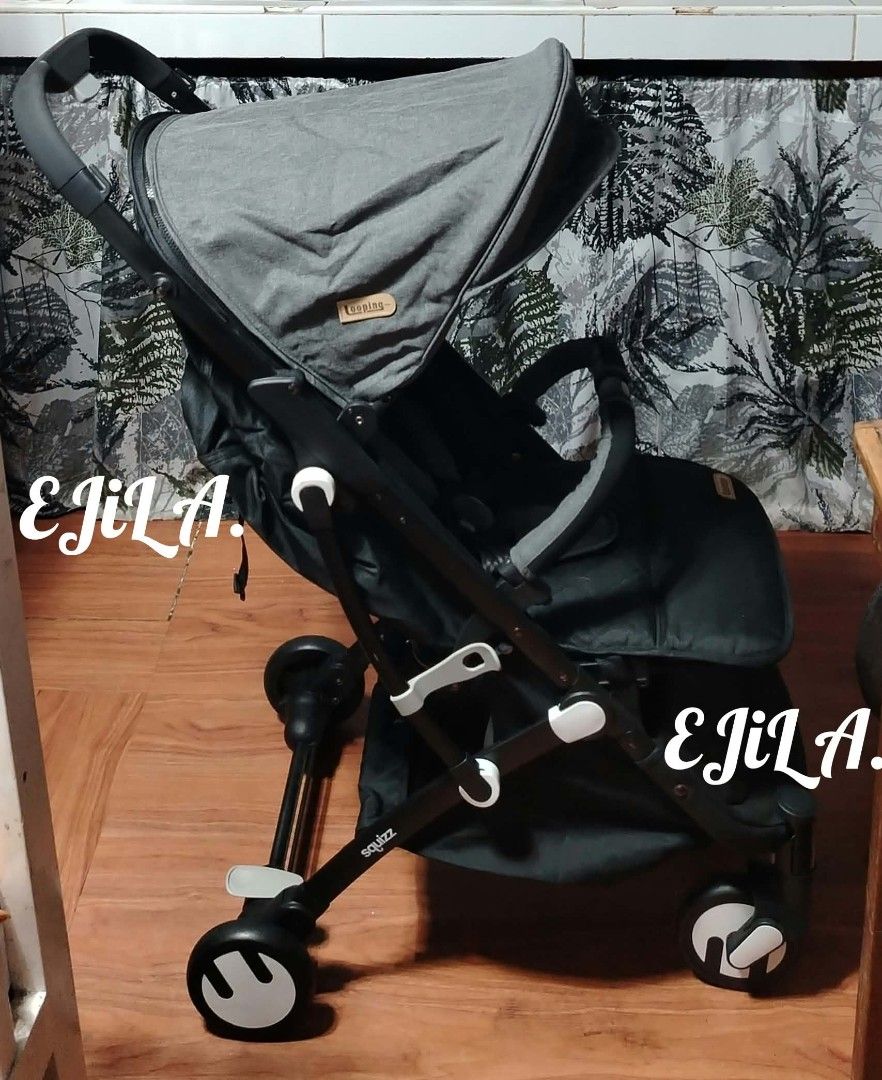 Looping Squizz 3-Compact Travel Stroller Black Grey (Category: Strollers) located in Las Pinas. Submitted by liveflower_ab46a2 (Listing ID 1470303218, Image 3). Description: - Model: Looping Squizz Stroller (Black and Grey) - Ultra-compact fold with a built-in pull handle for easy travel and storage - Lalmightweight frame equipped with smooth-rolling wheels - Includes protective canopy, 5-point safety harness with shoulder pads, and bumper bar - 