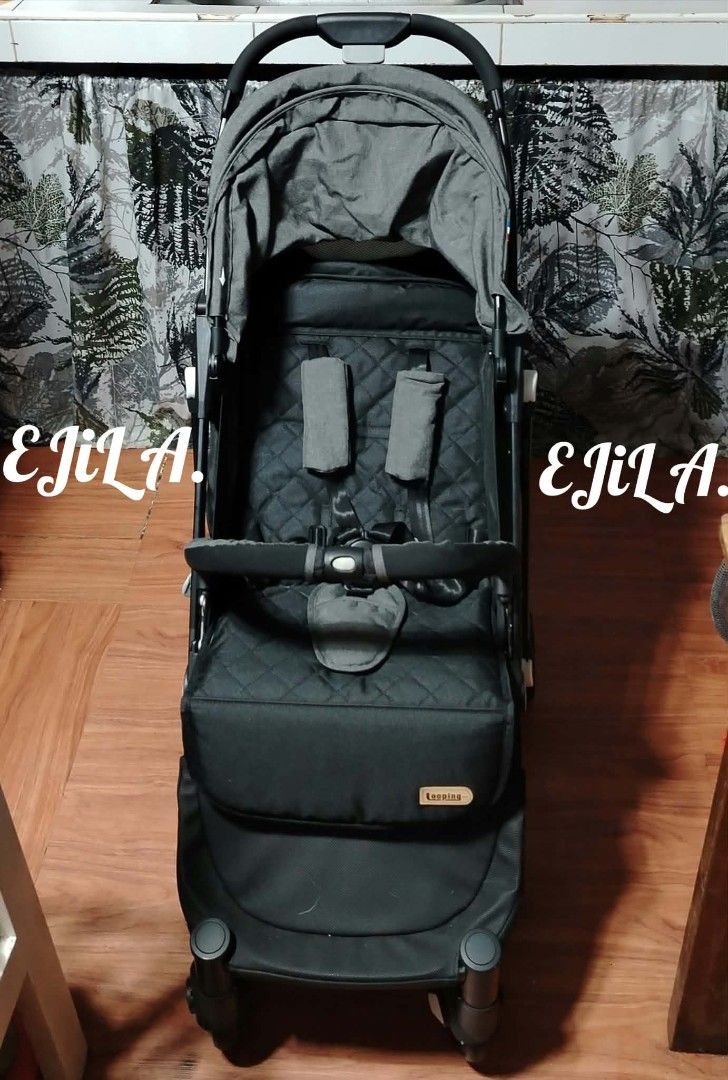 Looping Squizz 3-Compact Travel Stroller Black Grey (Category: Strollers) located in Las Pinas. Submitted by liveflower_ab46a2 (Listing ID 1470303218, Image 1). Description: - Model: Looping Squizz Stroller (Black and Grey) - Ultra-compact fold with a built-in pull handle for easy travel and storage - Lalmightweight frame equipped with smooth-rolling wheels - Includes protective canopy, 5-point safety harness with shoulder pads, and bumper bar - 