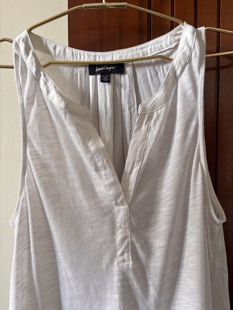 Lord & Taylor White Sleeveless (Category: Sleeveless) located in Manila. Submitted by minieiv._ (Listing ID 1470206420, Image 2). Description: * Pre-loved * Slightly used, 8/10 * US bought * Size: XS but can fit medium frame * RFS: Decluttering * Meetup: Puregold San Mateo, Ampid Mercury.