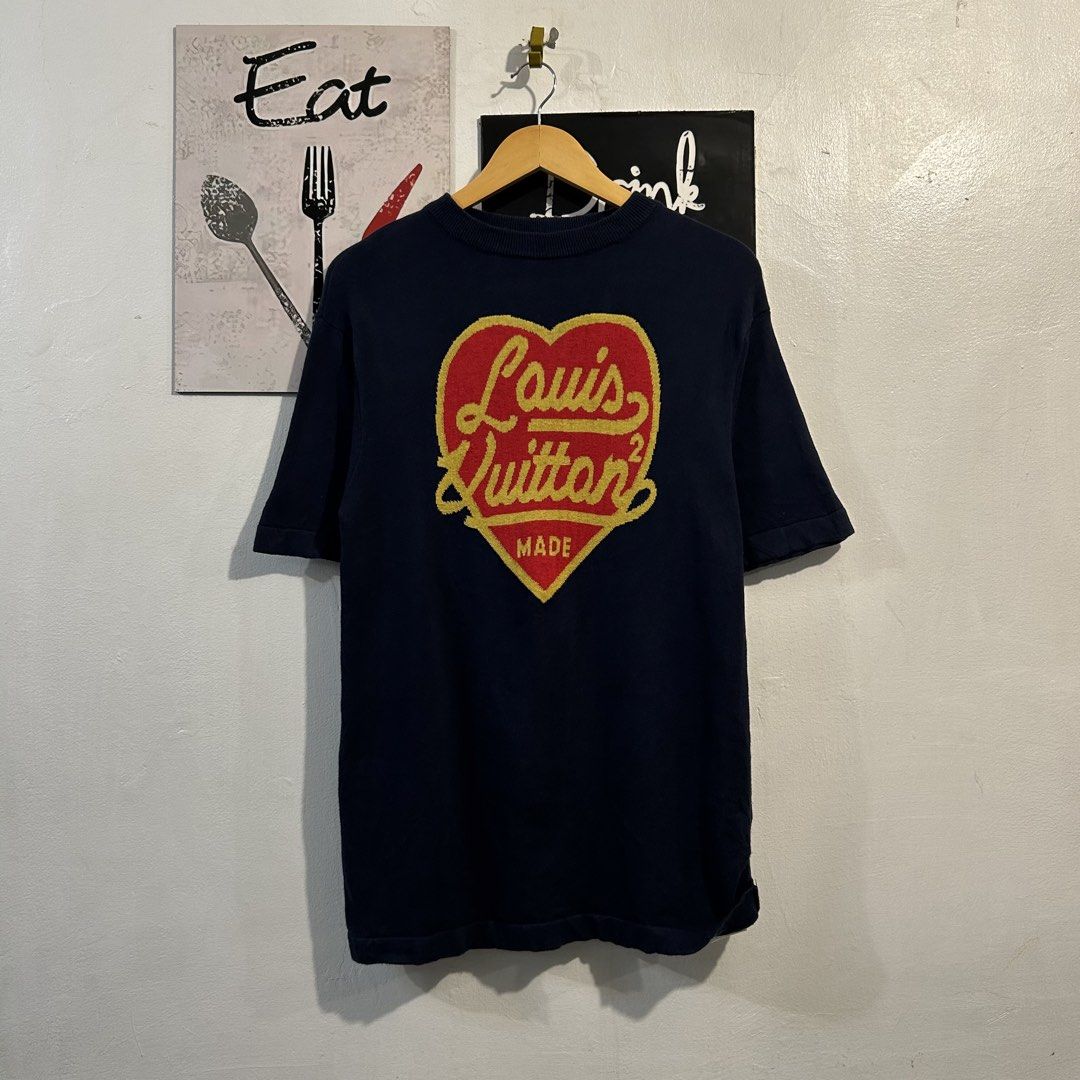 Louis Vuitton Heart Graphic Tee Navy Blue (Category: Tshirts & Polo Shirts ) located in Manila. Submitted by jakes_thrift_shop (Listing ID 1470310310, Image 1). Description: - Brand: Louis Vuitton - Color: Navy blue with red and yellow heart graphic - Material: Soft knit fabric (Made in Italy) - Design: Crew neck, short sleeves, signature script lettering - Condition: Excellent, with interior branding and care tags attached.