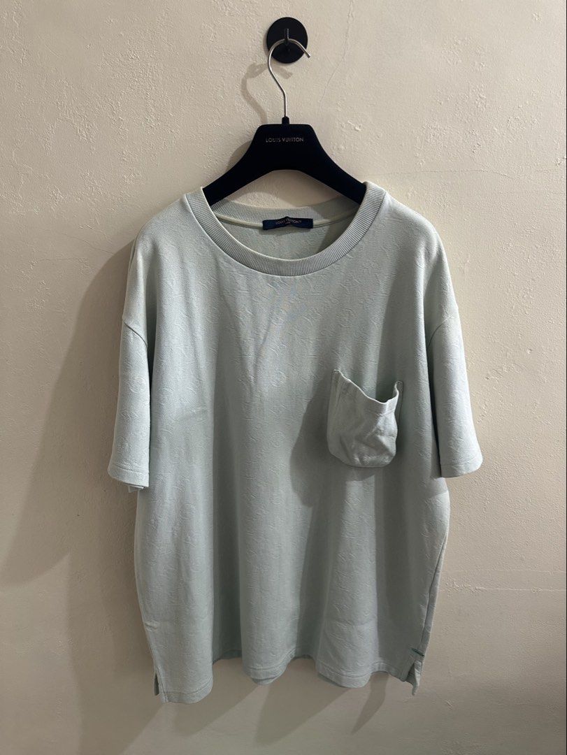 Louis Vuitton Monogram 3D Pocket T-Shirt (Category: Formal Shirts) located in Digos. Submitted by jayarshop (Listing ID 1470226741, Image 2). Description: - Condition: Good condition, 8/10 pre-owned condition. Slight discoloration in some areas. - Size: L (Large) Width 24 Length 28 - Color: Mint Green - Material: 100% Cotton (Premium textured knit fabric) - Origin: Made in Italy (Style Code: RM232Q TCL HIY49W) Features: - All-over embossed signat