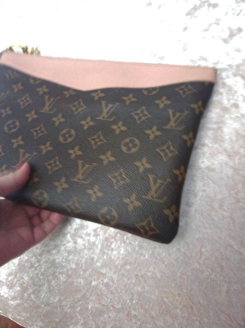 Auth Louis Vuitton Monogram Canvas and Pink Leather Pouch (Category: Luxury Bags & Wallets) located in Manila. Submitted by whemc (Listing ID 1470267609, Image 3). Description: - Authentic Louis Vuitton monogram canvas pouch - Stylish textured pink leather trim with gold-tone top zipper - Includes a detachable monogram bunny charm with flower motifs - Soft suede-like neutral interior lining - Made in France tag inside - Condition: Pristine / Well