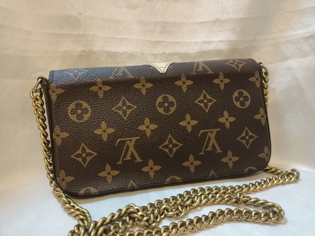 Louis Vuitton Monogram Canvas Owl Crossbody Bag (Category: Luxury Bags & Wallets) located in Manila. Submitted by preloved439 (Listing ID 1466391102, Image 2). Description: - Louis Vuitton monogram canvas crossbody bag - Eye-catching owl face design with pink/white leather appliques, studs, and black feather details - Chic chunky gold-tone chain strap - Secure magnetic snap closure - Compact size, perfect for daily essentials - Minimal flaws (see