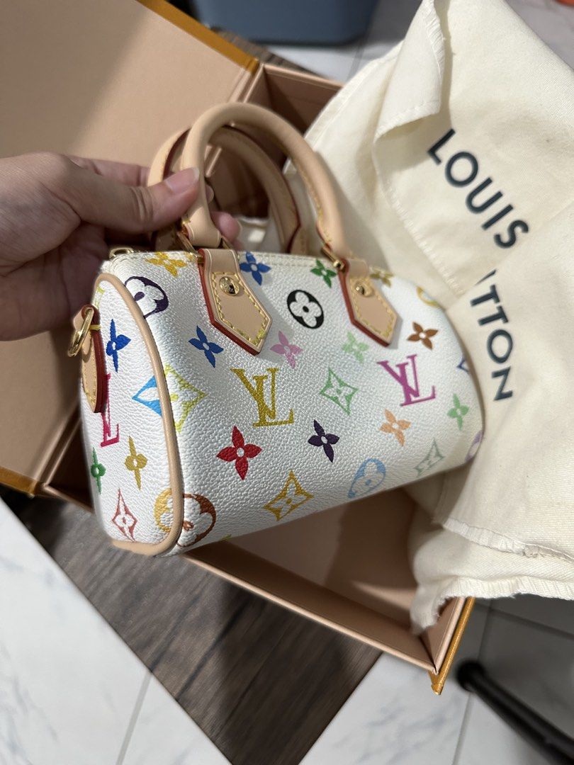 Louis Vuitton Murakami Nano Speedy (Category: Luxury Bags & Wallets) located in Quezon City. Submitted by shop.theclutter (Listing ID 1470285276, Image 2). Description: NGA Comes with box, strap, and dust bag Flaw: stains (see pics) Actual photos posted.