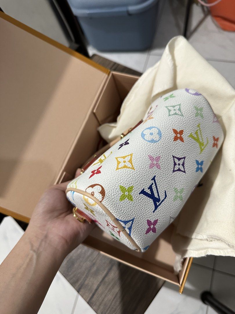 Louis Vuitton Murakami Nano Speedy (Category: Luxury Bags & Wallets) located in Quezon City. Submitted by shop.theclutter (Listing ID 1470285276, Image 3). Description: NGA Comes with box, strap, and dust bag Flaw: stains (see pics) Actual photos posted.
