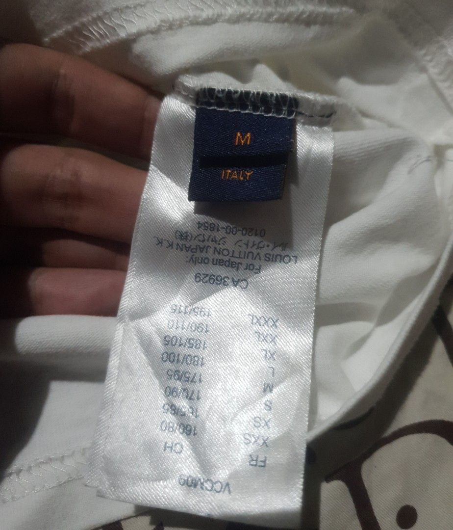 Louis Vuitton plain white shirt (Category: Tshirts & Polo Shirts ) located in San Fernando. Submitted by retro.district. (Listing ID 1470344840, Image 3). Description: - Louis Vuitton plain white shirt LV - Size: Medium(19x26) - Condition: Excellent - No issue.