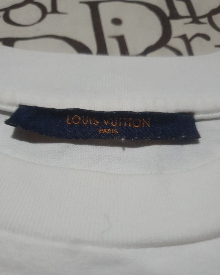 Louis Vuitton plain white shirt (Category: Tshirts & Polo Shirts ) located in San Fernando. Submitted by retro.district. (Listing ID 1470344840, Image 2). Description: - Louis Vuitton plain white shirt LV - Size: Medium(19x26) - Condition: Excellent - No issue.