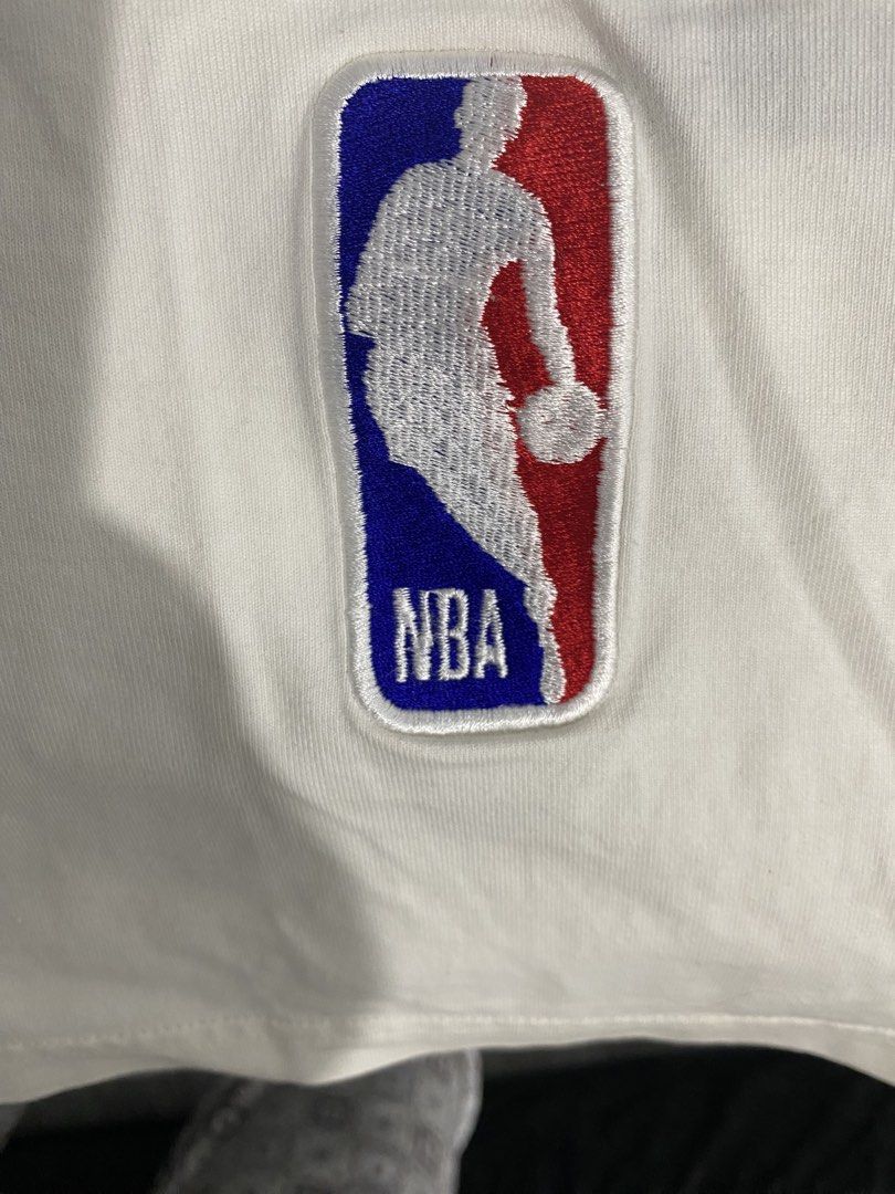 Louis Vuitton x NBA Logo White Tee (Category: Tshirts & Polo Shirts ) located in Manila. Submitted by annroque26 (Listing ID 1470289906, Image 3). Description: Send me a personal message for offers - Authentic Louis Vuitton x NBA collaboration t-shirt - Crisp white cotton fabric with standard crew neck - Colorful embroidered LV letters on the chest - Official stitched NBA patch near the bottom hem - Style Code: RM212M DT3 HLY20W | CA 36929 - Clea