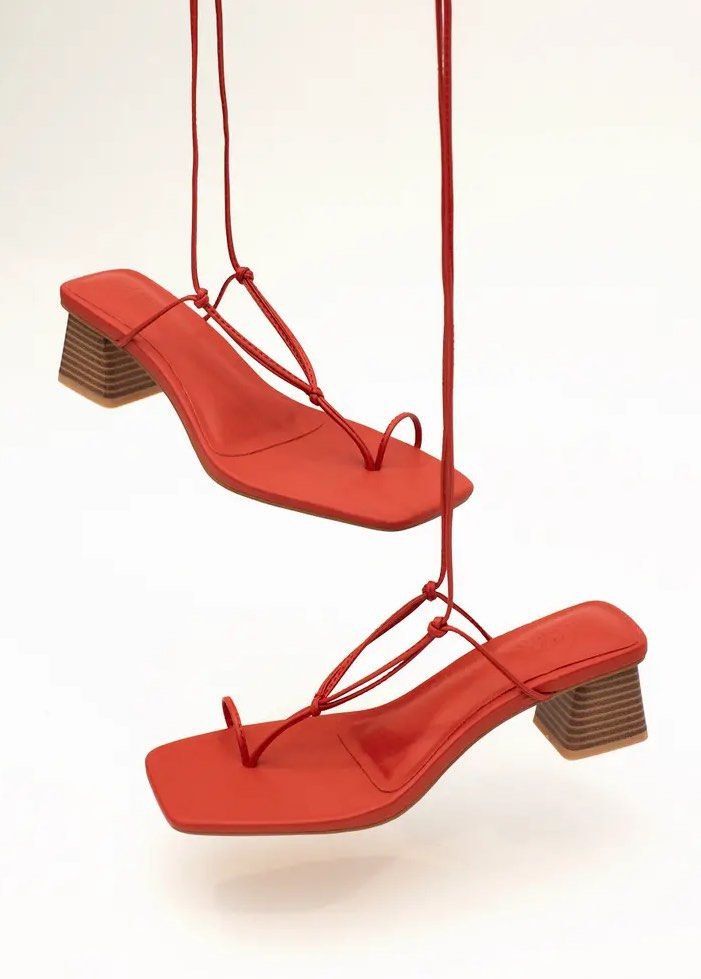 Love Bonito Red Lace-Up Heels (Category: Heels) located in Manila. Submitted by cor41899 (Listing ID 1470245794, Image 2). Description: Inquire for more pictures! - Brand: Love Bonito - Color: Bright red (great pop of color for any outfit) - Design: Square toe with delicate lace-up ankle straps - Heel: Comfortable, chunky patterned wooden block heel for easy walking - Condition: Excellent.