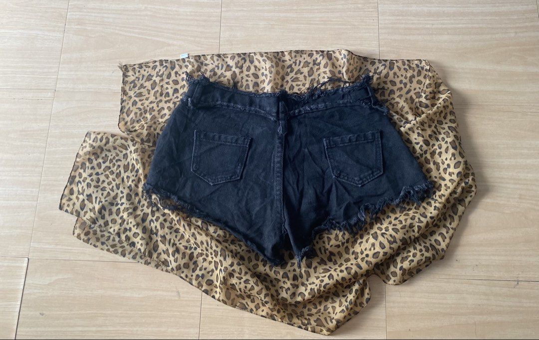 low rise black distressed denim shorts, asymmetrical hems and subtle stud (Category: Shorts) located in Manila. Submitted by lavernsloop (Listing ID 1470074929, Image 3). Description: size 25| low lenght 10 📩DM FOR MORE DEETS!.