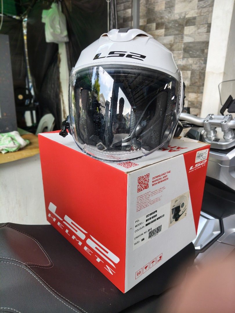 LS2 Verso Mono Gloss White Helmet Size XXL (Category: Other Motorcycles Parts and Accessories) located in Makati City. Submitted by joel_888 (Listing ID 1470165763, Image 2). Description: - Model: LS2 Verso Open-Face Helmet (Mono Gloss White) - Size: XXL - Visors: Clear outer visor + internal drop-down sun visor - Condition: Clean, intact interior padding with quick-release buckle - Inclusions: Original red and white box - Extras: GoPro mount on 