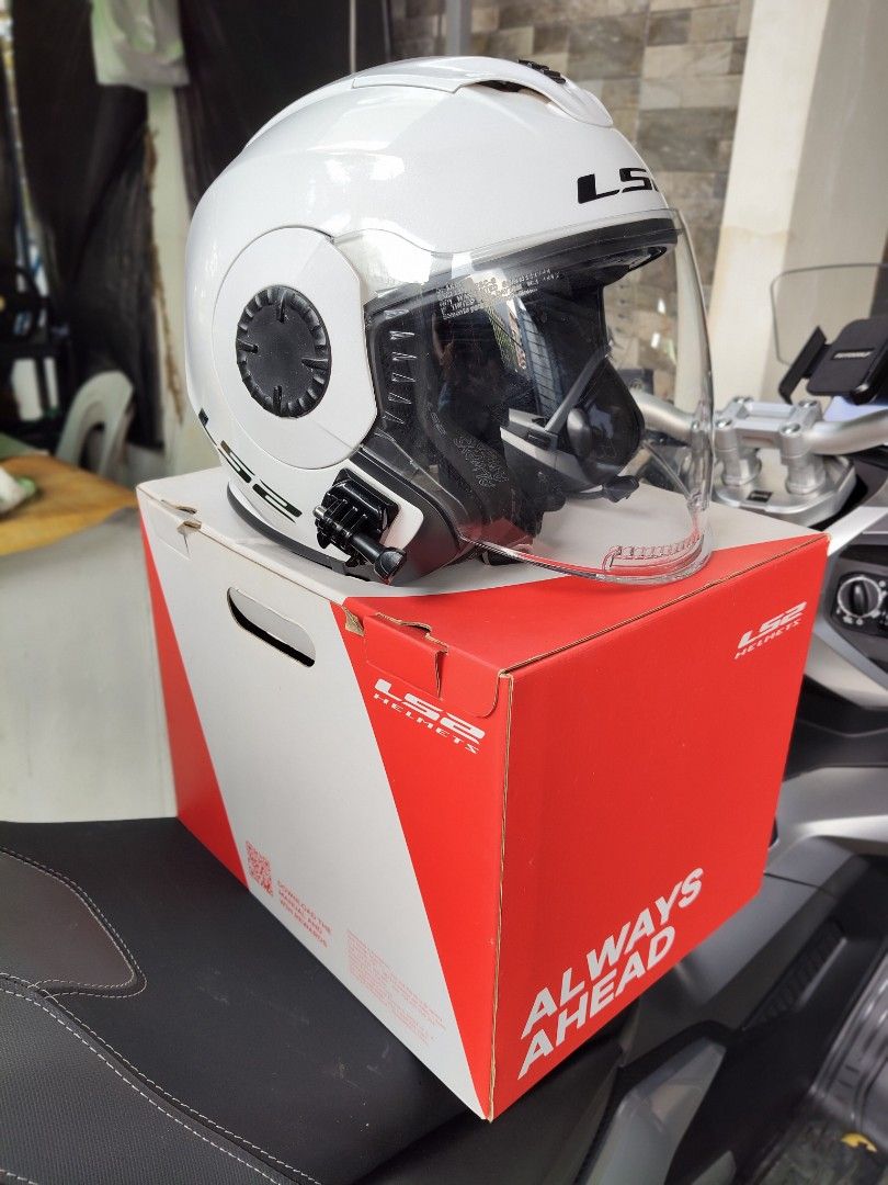 LS2 Verso Mono Gloss White Helmet Size XXL (Category: Other Motorcycles Parts and Accessories) located in Makati City. Submitted by joel_888 (Listing ID 1470165763, Image 1). Description: - Model: LS2 Verso Open-Face Helmet (Mono Gloss White) - Size: XXL - Visors: Clear outer visor + internal drop-down sun visor - Condition: Clean, intact interior padding with quick-release buckle - Inclusions: Original red and white box - Extras: GoPro mount on 