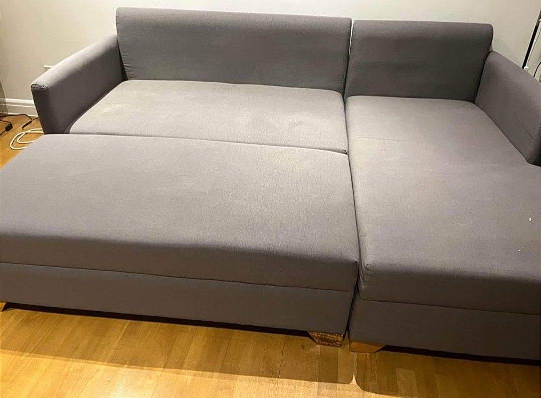 L-shaped modular sofa with Ottoman (Category: Sofas) located in Taytay. Submitted by luckybear_755b37 (Listing ID 1470337824, Image 3). Description: Subject: L-Shaped Modular Sofa with Ottoman – ₱13,000 Description: Selling our L-shaped modular sofa with ottoman for only ₱13,000! ✔️ Good condition ✔️ Gray fabric with wooden legs ✔️ Spacious and comfortable ✔️ Can be converted into a bed using the ottoman Dimensions: - Long side: 81 inches - Chais