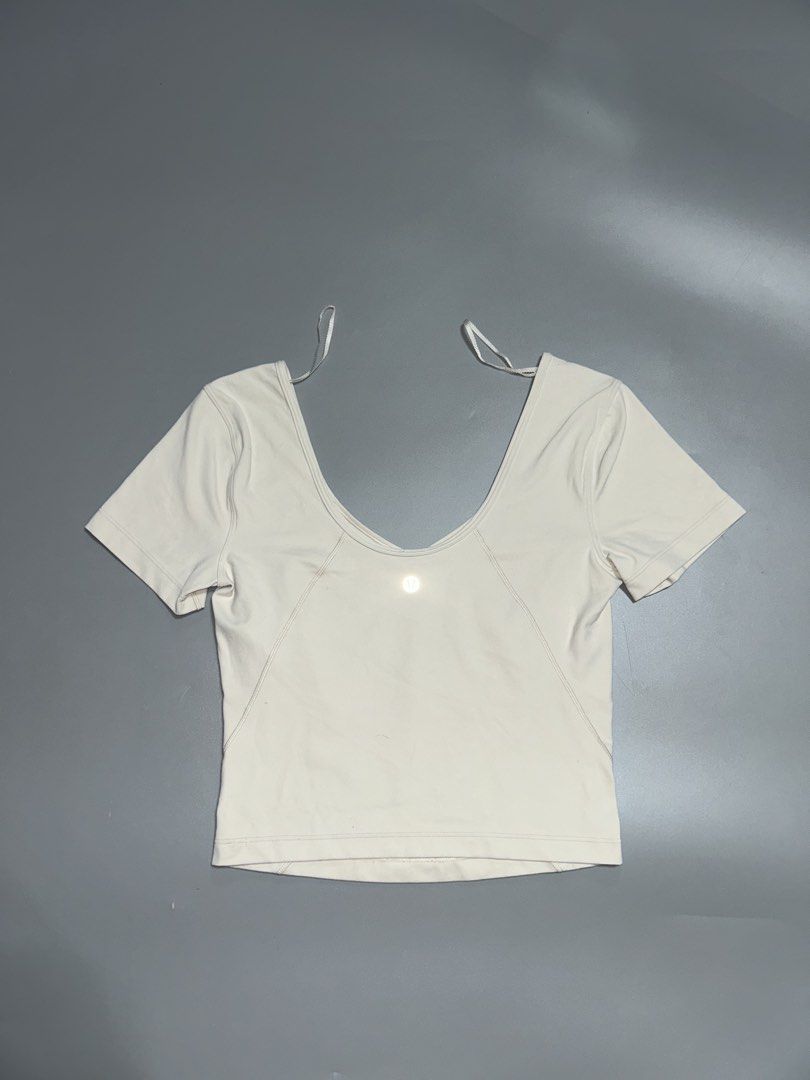Lululemon Align tee croptop (authentic) (Category: Activewear) located in Trece Martires City. Submitted by flip_flips (Listing ID 1470321006, Image 1). Description: Lululemon Align tee croptop (authentic) -Dimes: 14-18 width stretch 17 length -like new condition -9.5/10 color rate -issue: none.