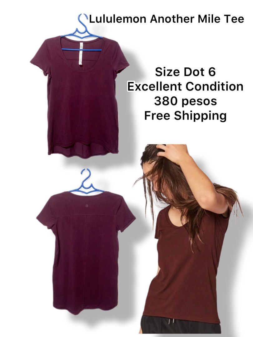 Lululemon Another Mile Tee Size Dot 6 (Category: Activewear) located in Meycauayan. Submitted by epicforest_231b9d (Listing ID 1470266568, Image 1). Description: - Brand: Lululemon - Style: Another Mile Tee - Color: Deep berry purple - Size: 6 (size dot verified) - Design: Scoop neckline, short sleeves, high-low curved hem, and subtle reflective logo at upper back - Fabric: Soft, breathable, and sweat-wicking athletic material - Condition: Excell