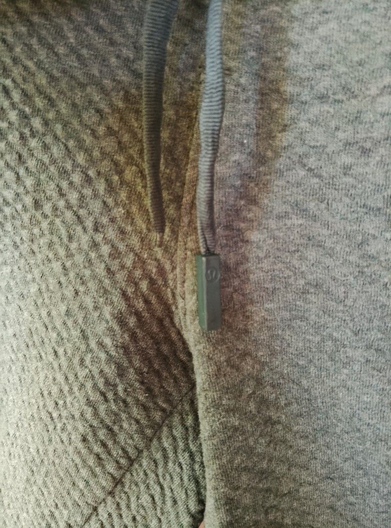 Lululemon At ease 7" Green Textured Drawstring Shorts Size XL (Category: Activewear) located in Tayum. Submitted by purephoenix.0f7166 (Listing ID 1470164880, Image 3). Description: - Brand: Lululemon - 33-38 waistline - Size: XL - Color: Green with textured grid pattern and contrast black back waist panel - Waistband: Black elastic with adjustable drawstring and logo-branded metal aglets - Pockets: Deep side pockets - Condition: Clean, tags inta