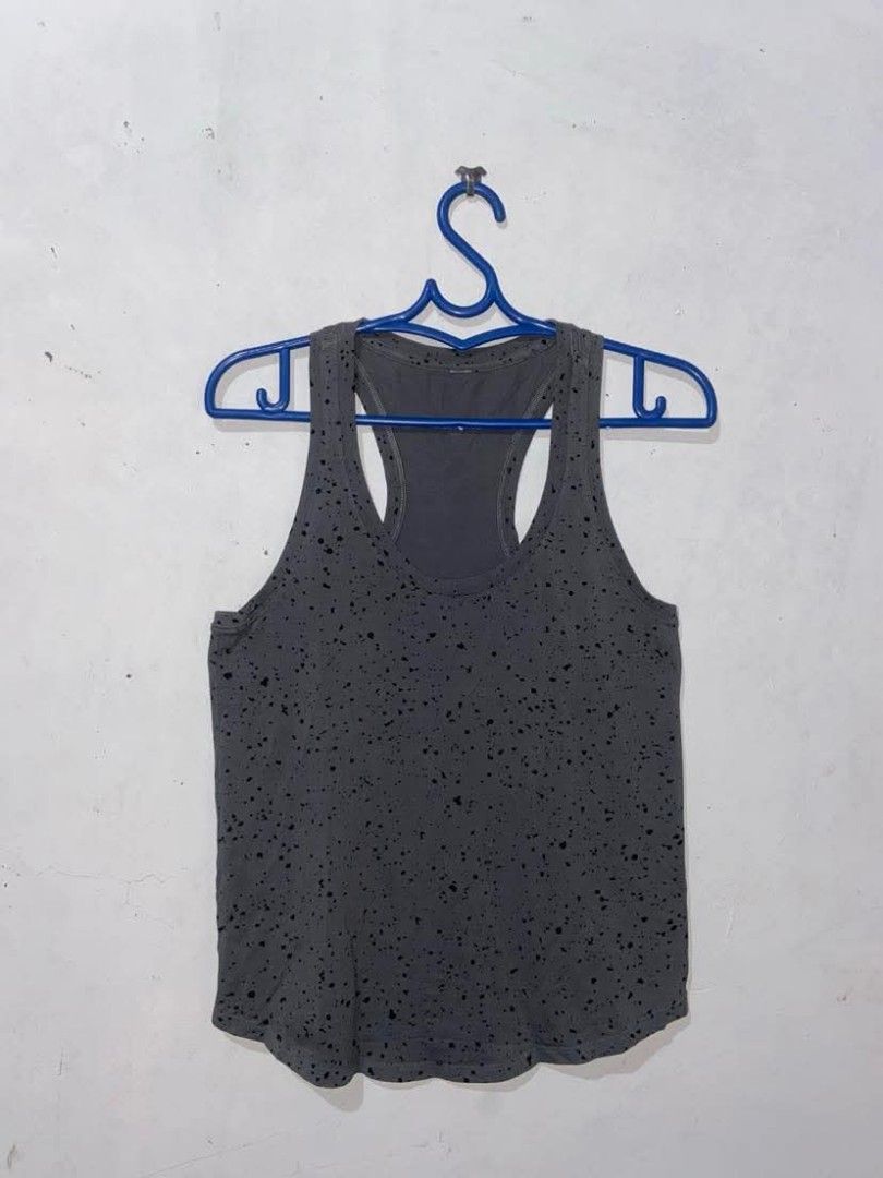 Lululemon Love Tanktop (Category: Sleeveless) located in Meycauayan. Submitted by epicforest_231b9d (Listing ID 1470266173, Image 2). Description: - Brand: Lululemon - Style: Love Tank Top (Scoop neck, racerback, curved hem) - Color: Grey with black speckled pattern - Size: 6 (Size dot intact, cut tag) - Measurements: Approx. 16" width x 23" length - Condition: Great shape, well-maintained - Perks: FREE shipping included!.