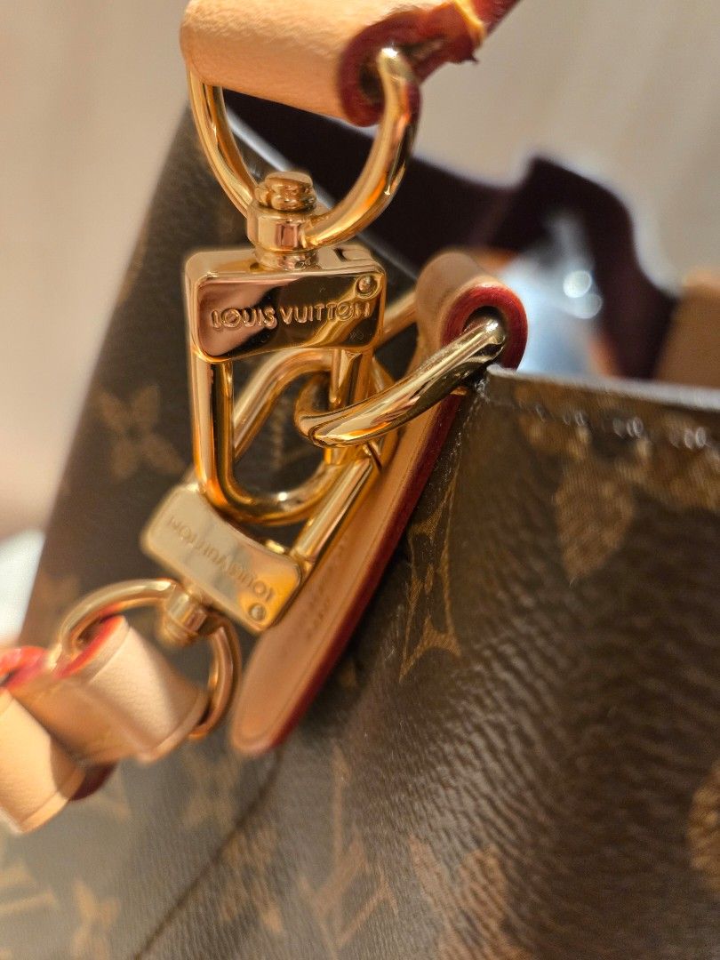 Louis Vuitton NeoNoe BB Monogram (Category: Luxury Bags & Wallets) located in Manila. Submitted by luxtimeless (Listing ID 1470265211, Image 3). Description: - Authentic Louis Vuitton NeoNoe bucket bag - Iconic brown monogram coated canvas with natural cowhide leather trim - Luxurious burgundy microfiber interior lining - Secure drawstring top closure with shiny gold-tone hardware - Stamped Louis Vuitton Paris, Made in France - Clean overall cond
