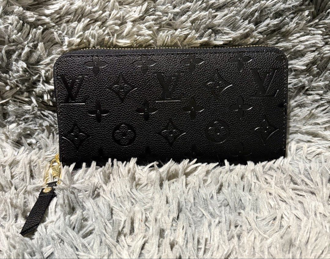 LV Zippy Wallet (Category: Luxury Bags & Wallets) located in Manila. Submitted by jlj_v.2_oshop (Listing ID 1470186365, Image 2). Description: ORIGINAL LV Zippy Wallet (or a similar style like the Clémence) crafted from embossed Monogram Empreinte leather with gold-color hardware..