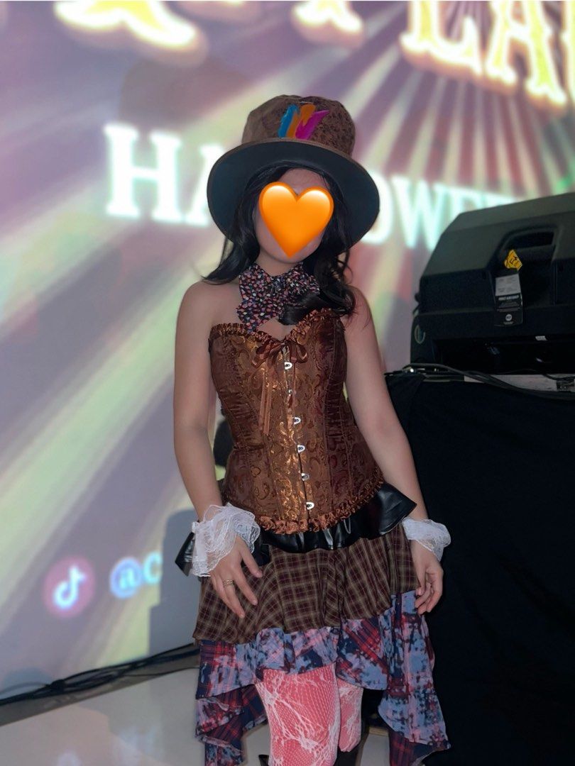 Mad Hatter Halloween Costume (Category: Sets or Coordinates) located in Manila. Submitted by dxcluttering (Listing ID 1470256355, Image 2). Description: For sale! Used once only Sold as a set 🎩⏱️🤎🫖 Inclusions: • Brown Corset (XS) • Asymmetrical Skirt (XS) • Mad Hatter top hat • Neck tie/Bow • Lace cuffs • Red tights • Lace tights Best paired with boots!! 🔥 (not included) For shipping/meetup: Lalamove/grab around metro manila. Sf c/o buyer Can