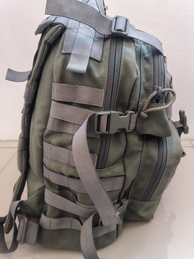 Magforce International Tactical Olive Green Backpack (Category: Backpacks) located in Tanza. Submitted by antares0048 (Listing ID 1470197094, Image 3). Description: NO ISSUE - Authentic Magforce International backpack in solid olive green - Rugged, heavy-duty fabric and robust hardware built to last - Multiple exterior zippered compartments for organized storage - MOLLE webbing and D-rings for attaching extra gear - Comfortable adjustable padded 
