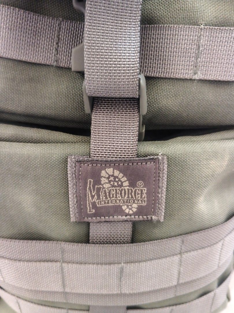Magforce International Tactical Olive Green Backpack (Category: Backpacks) located in Tanza. Submitted by antares0048 (Listing ID 1470197094, Image 2). Description: NO ISSUE - Authentic Magforce International backpack in solid olive green - Rugged, heavy-duty fabric and robust hardware built to last - Multiple exterior zippered compartments for organized storage - MOLLE webbing and D-rings for attaching extra gear - Comfortable adjustable padded 