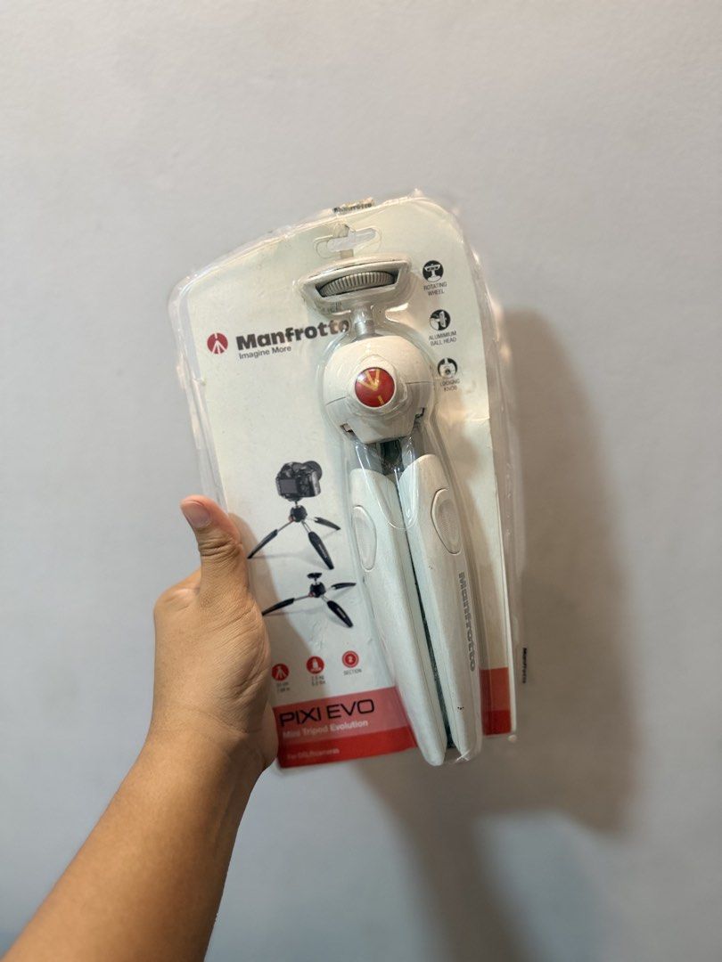 Manfrotto PIXI EVO Mini Tripod White (Category: Tripods & Monopods) located in San Mateo. Submitted by tiktok.tiktok (Listing ID 1470195008, Image 1). Description: - Brand new and 100% unopened in original retail packaging - Sleek white design, proudly designed in Italy - Durable aluminium construction for the ball head and legs - Adjustable two-section legs with 5 flexible position angles - Supports up to 2.5kg of camera or phone gear - Includes