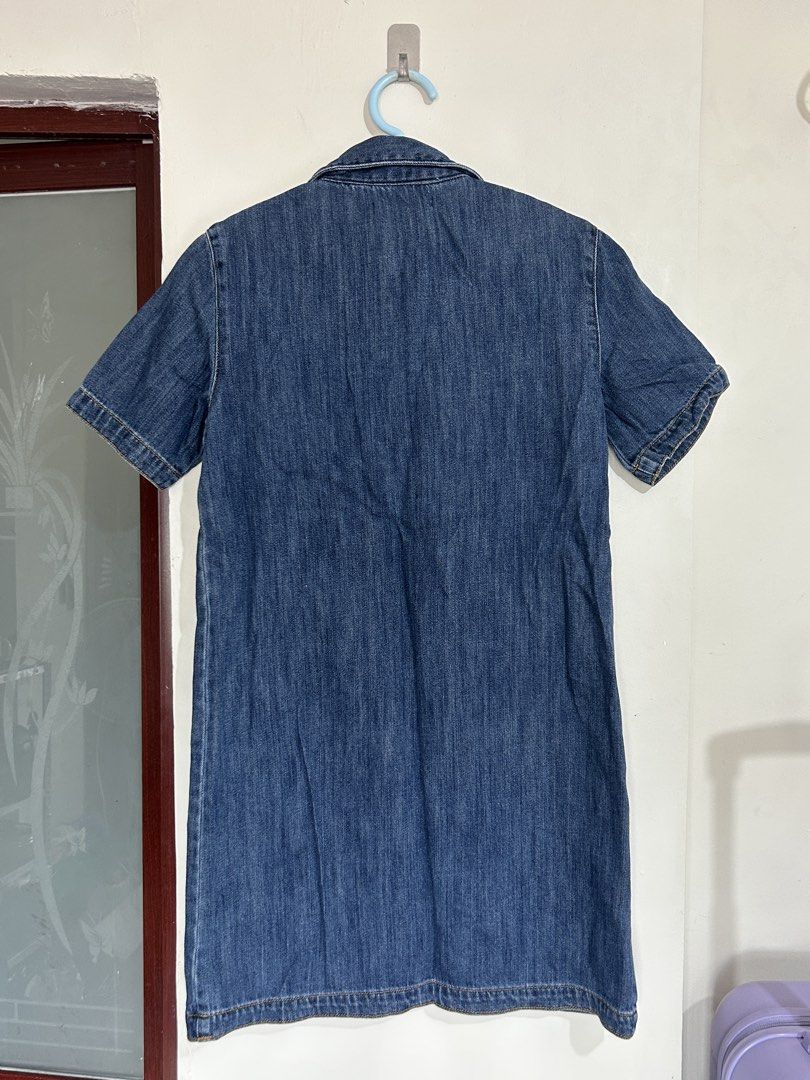 Mango Denim & Tees Blue Denim Dress (Category: Dresses) located in Pasig City. Submitted by eddwuhrd (Listing ID 1470167629, Image 2). Description: - Brand: Mango Denim & Tees - Style: Blue denim shirt dress with short sleeves, button placket, and chest pocket - Size: Tagged EUR S / USA XS - Measurements: Waist approx. 30-34 inches (flat), Length approx. 36 inches - Condition/Material: Good fabric weight, perfect for casual everyday wear.