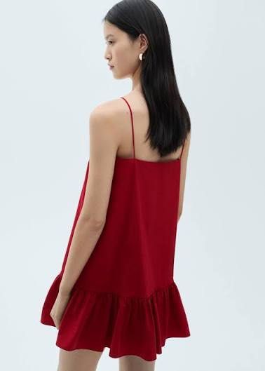 Mango Red spaghetti strap mini dress with ruffled hem (Category: Dresses) located in Cebu City. Submitted by uniquepreloved88 (Listing ID 1470312768, Image 2). Description: Vibrant red mini dress with thin spaghetti straps and a straight neckline. Dropped waistline featuring a ruffled hem tier. Lightweight fabric, hits above the knee. Clean solid red color throughout. Simple slip-on style with structured fit. Great piece for warm weather or casua