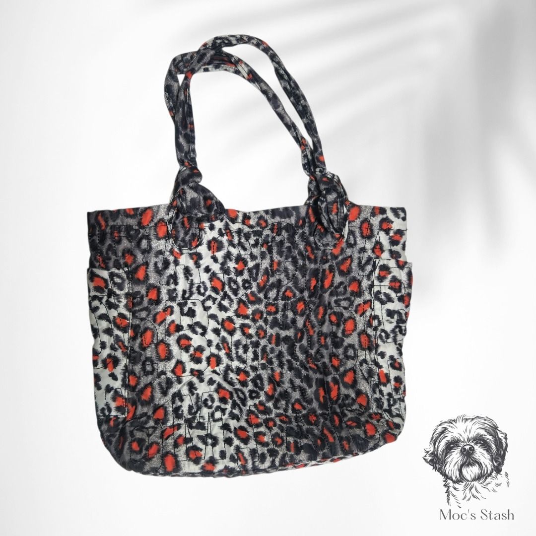 Marc by Marc Jacobs Quilted Nylon Leopard Tote Bag (Category: Shoulder Bags) located in Caloocan City. Submitted by mocs.stash (Listing ID 1470179848, Image 2). Description: Marc by Marc Jacobs Quilted Nylon Leopard Tote Bag Selling for ₱1,000 (SRP: ~₱12,000) Brand: Marc by Marc Jacobs Condition: Preloved in great condition Price: ₱1,000 Shipping & Location Details: Location: Caloocan Shipping Fee: Paid by buyer Couriers: Grab Express, Lalamove, 