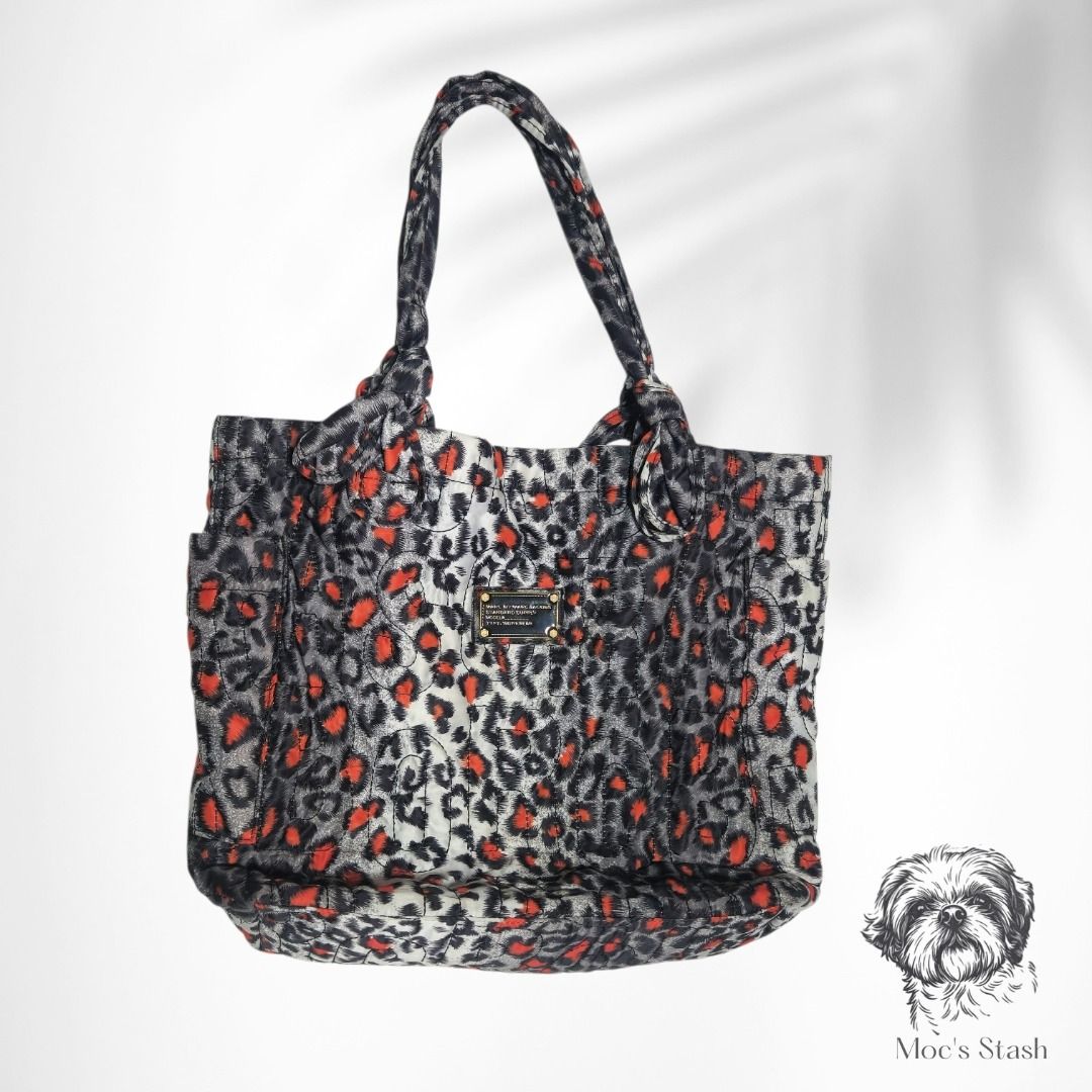 Marc by Marc Jacobs Quilted Nylon Leopard Tote Bag (Category: Shoulder Bags) located in Caloocan City. Submitted by mocs.stash (Listing ID 1470179848, Image 3). Description: Marc by Marc Jacobs Quilted Nylon Leopard Tote Bag Selling for ₱1,000 (SRP: ~₱12,000) Brand: Marc by Marc Jacobs Condition: Preloved in great condition Price: ₱1,000 Shipping & Location Details: Location: Caloocan Shipping Fee: Paid by buyer Couriers: Grab Express, Lalamove, 