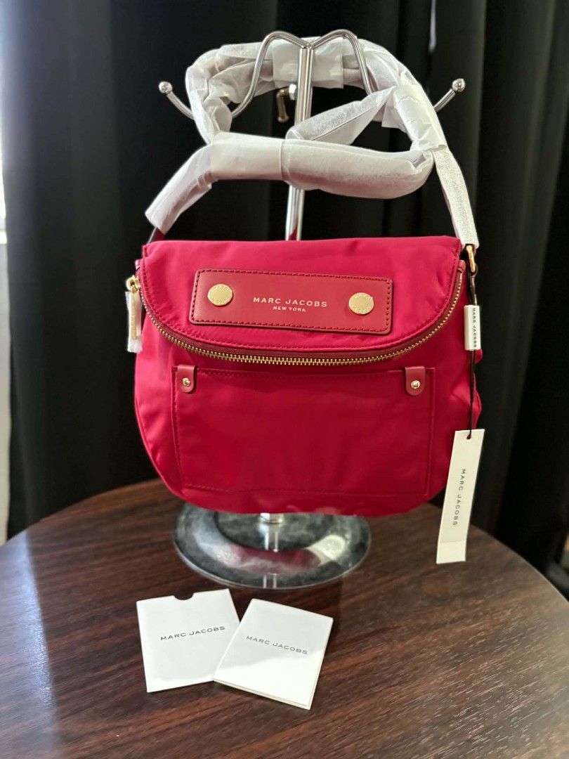 Marc Jacobs Nylon Messenger Bag Red (Category: Luxury Bags & Wallets) located in Manila. Submitted by estelpaola25 (Listing ID 1470146153, Image 1). Description: ‎📣 SALE 📣 SALE 📣 SALE ‼️‼️ ‎ ‎M@rc J@cobs bag 💯💯💯❤️❤️❤️ ‎ ‎✨ from p6500 to final markdown price: p5500!!! 😍 ‎ ‎✅ 100% authentic, sourced directly from Canada 🇨🇦 ‎ ‎📬📬 send DM for inquiries 📬📬.