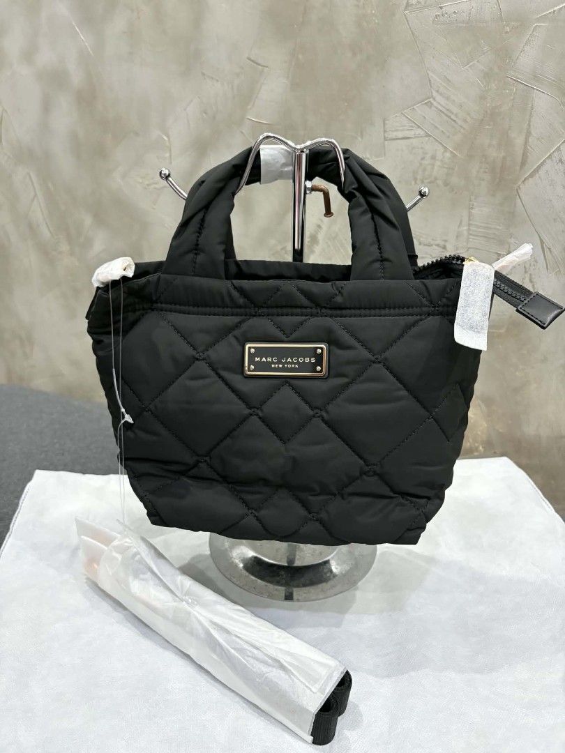 Marc Jacobs Quilted Nylon Tote Bag Black (Category: Luxury Bags & Wallets) located in Manila. Submitted by estelpaola25 (Listing ID 1470146581, Image 1). Description: ‎📣 SALE 📣 SALE 📣 SALE ‼️‼️ ‎ ‎M@rc J@cobs bag 💯💯💯❤️❤️❤️ ‎ ‎✨ from p8900 to p7500 only!!! 😍 ‎ ‎✅ 100% authentic, sourced directly from Canada 🇨🇦 ‎ ‎📬📬 send DM for inquiries 📬📬.