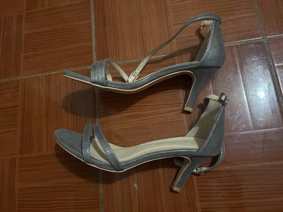 Mario D'boro Silver Pewter Heels Size 38 (Category: Heels) located in Manila. Submitted by bingkiecha (Listing ID 1470203107, Image 1). Description: - Brand: Mario D'boro - Style: Strappy stiletto heels with ankle buckle closure - Color: Pewter silver - Size: 38 (Standard fit) - Inclusion: Original box from SM Store - Ideal for: Parties, weddings, and formal night outs.