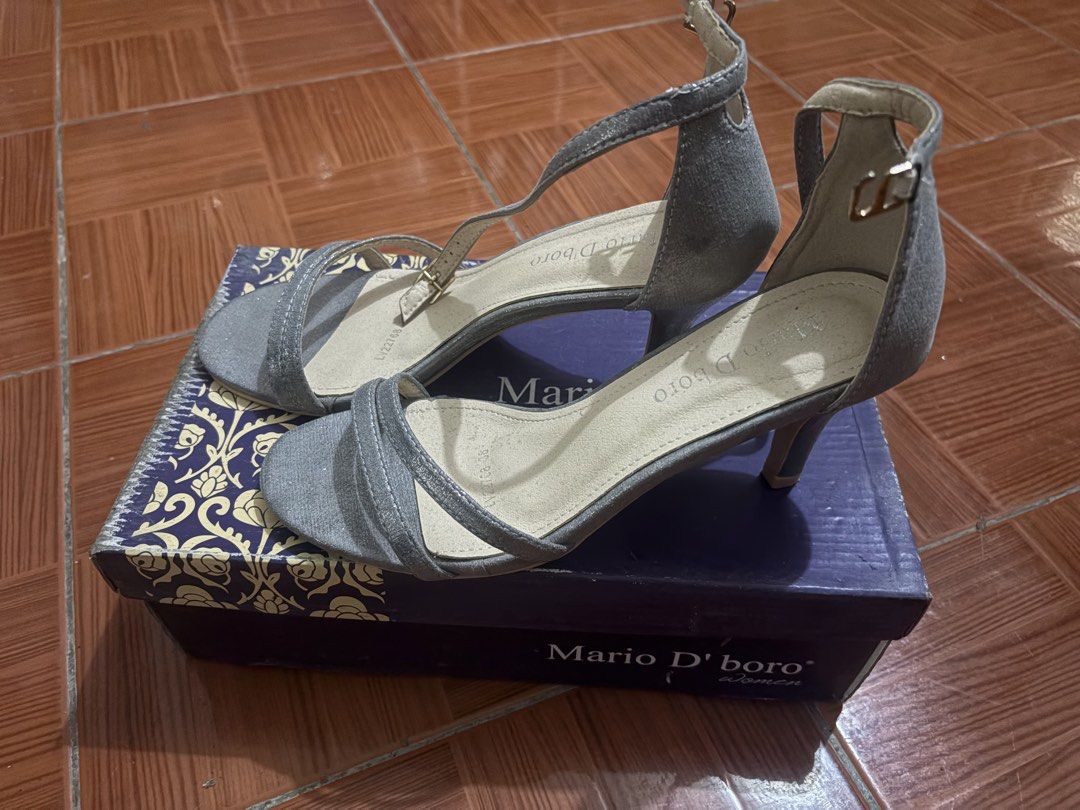 Mario D'boro Silver Pewter Heels Size 38 (Category: Heels) located in Manila. Submitted by bingkiecha (Listing ID 1470203107, Image 3). Description: - Brand: Mario D'boro - Style: Strappy stiletto heels with ankle buckle closure - Color: Pewter silver - Size: 38 (Standard fit) - Inclusion: Original box from SM Store - Ideal for: Parties, weddings, and formal night outs.
