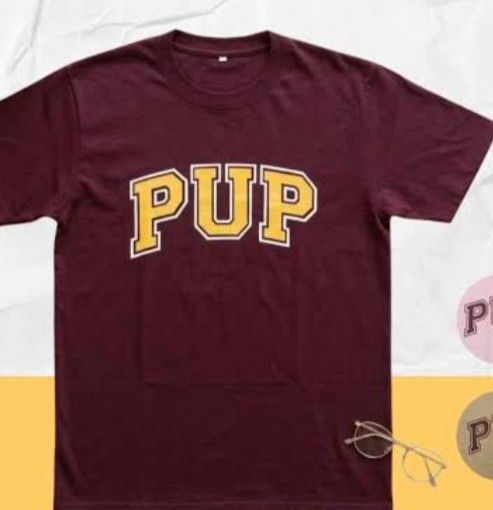 PUP Maroon Graphic T-Shirt (Category: Shirts) located in Valenzuela. Submitted by avizein (Listing ID 1470330573, Image 1). Description: - Color: Maroon - Design: Medium-Large PUP lettering in yellow and white outline - Material: Soft and breathable cotton - Fit: Standard fit with short sleeves - Condition/Style: Great casual piece for everyday wear Not really sure about the size. Owner is a plus-sized woman thus the M-L description. RFS is owner