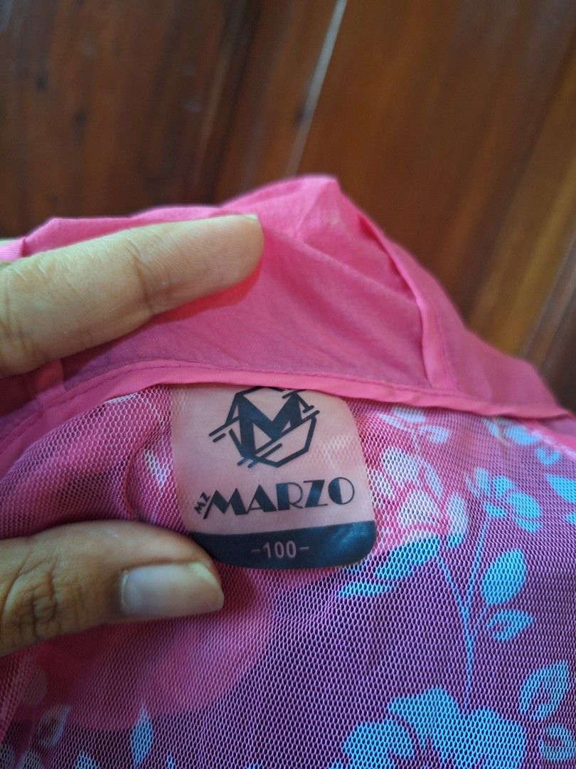 Y2K 2000s style Marzo Floral Pink Windbreaker Jacket Size 100 (Category: Coats, Jackets and Outerwear) located in Balamban. Submitted by ubethan (Listing ID 1470212329, Image 2). Description: - Brand: Marzo - Size: 100 - Color/Design: Pink with stylish white floral pattern on the back and sleeves, solid pink front chest panel and hood - Material: Lightweight mesh with transparent sections - Features: Full zip closure and secure zipped side pocket