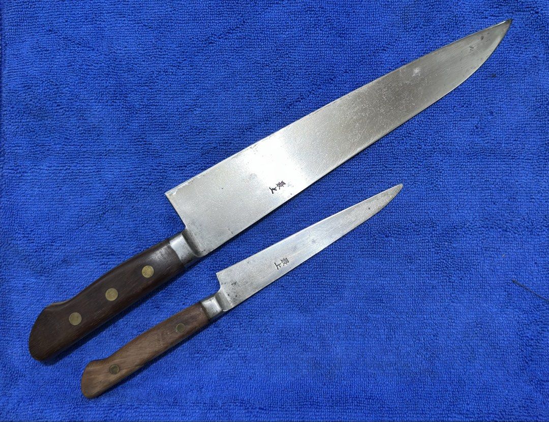 Masamoto Japanese Kitchen Knives Set (Category: Knives & Chopping Boards) located in Makati City. Submitted by capsicum06 (Listing ID 1470199794, Image 2). Description: Japanese Kitchen Knife Mamamoto Set 正本 Masamoto Gyuto Blade Length: 275mm Full Length: 400mm Blade: Sharp Handle: Intact Masamoto Petty Knife Blade Length: 140mm Full Length:250mm Blade: Sharp Handle: very little gap seen (pls see details on photos) 最上 (Saijō or Mogami), which tra