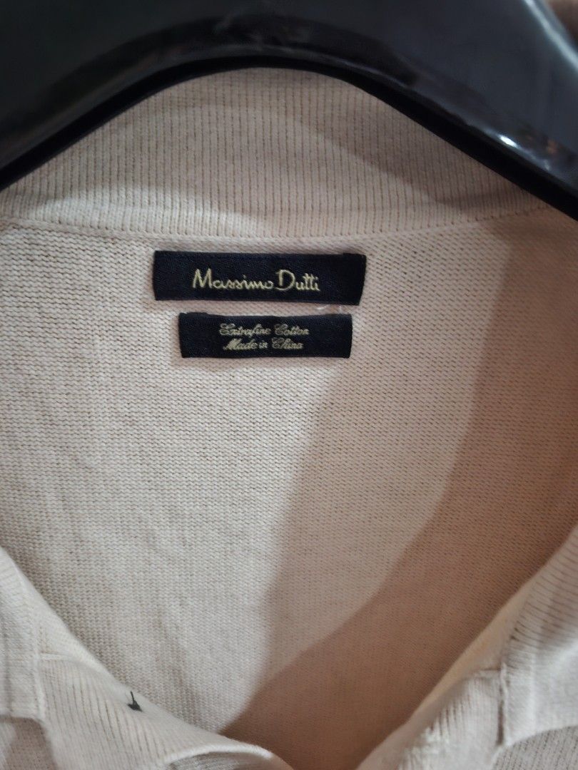 Massimo Dutti Extra Fine Cotton Polo Shirt (Category: Tshirts & Polo Shirts ) located in Quezon City. Submitted by phillip31 (Listing ID 1470348170, Image 2). Description: - Brand: Massimo Dutti - Item: Men's Polo Shirt - Color: Cream / Off-White - Size: L (EUR, USA, MEX) - Material: Extra Fine Cotton - Design: Clean knit texture with contrasting dark trim on the collar and sleeve cuffs, finished with a classic two-button placket - Style: Smart c