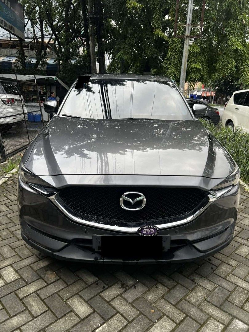 Mazda CX-5 2.2 AWD 6AT Diesel (A) (Category: Used Cars) located in Quezon City. Submitted by nathaniel.adam (Listing ID 1470243400, Image 3). Description: 2019 Mazda CX-5 2.2 AWD Diesel AT 💰 ₱820,000.00 Slightly Negotiable 📍 Quezon City - First owned, locally purchased - 34,708 miles (~55,857 km) - Machine Gray, black leather interior - Fully paid, complete OR/CR, registered 2026 - Regularly maintained; last PMS Oct 2026 - Rack & pinion replace